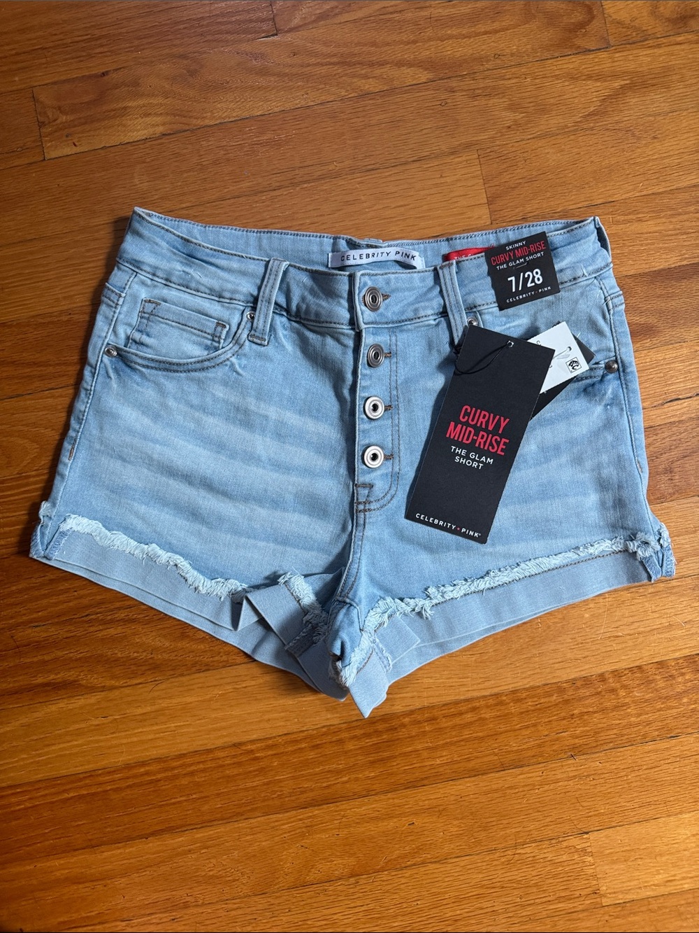 Celebrity Pink Light Wash Curvy Mid-Rise Denim Shorts